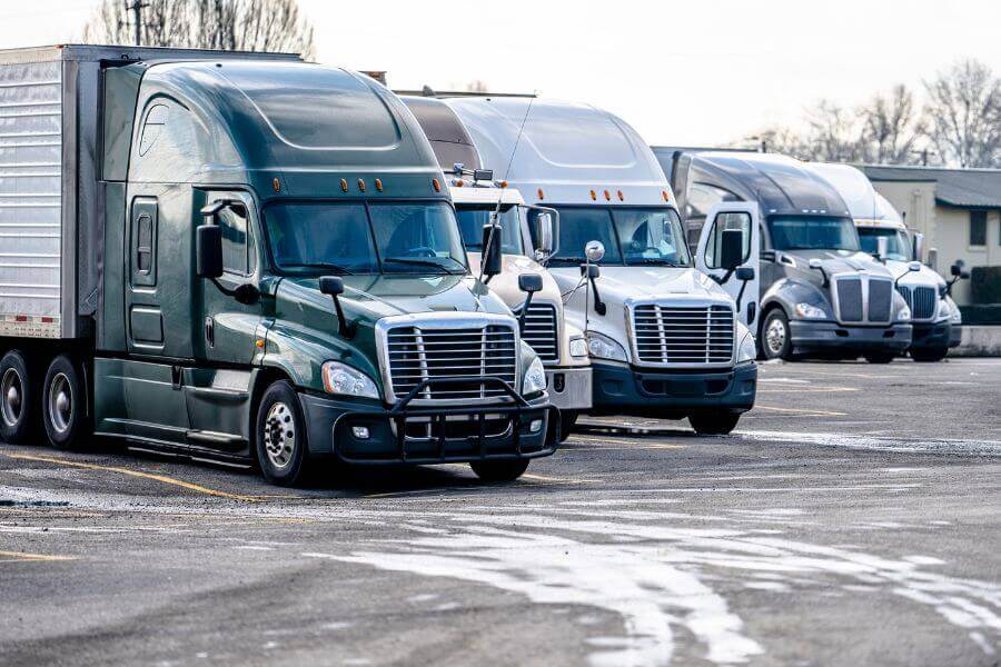 trucking activity dips reflecting ongoing freight market volatility logos logistics